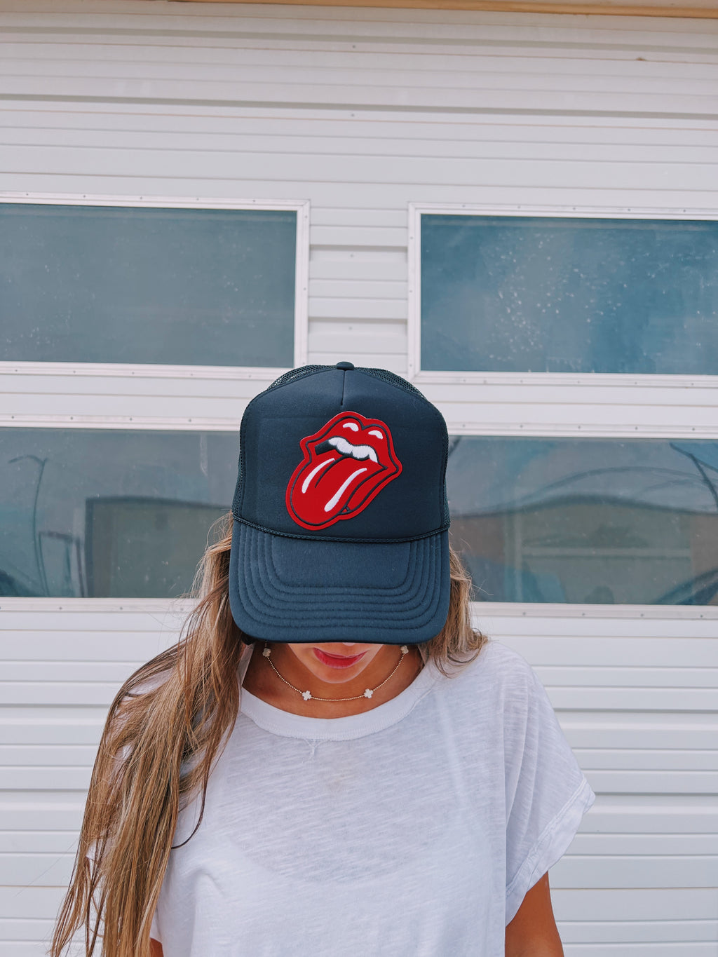 BLACK TRUCKER WITH ROLLING STONES PATCH